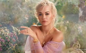 Rita Ora casts the spell of her beauty with a magic wand